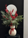 Festive Red Berry & Pine Arrangement and Snowman Vase - Sold Separately